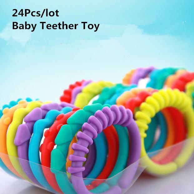 F274 24Pcs/set Baby Teether Toy Rattle Colorful Rainbow Molars Rings Crib Bed Gi 