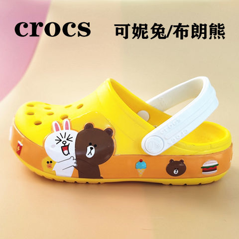 Crocsรองเท้ารองเท้าหลุม ชายและหญิงเด็กสีเหลืองเล็กๆน้อยๆกรัมเด็กชายและหญิงเด็กใหญ่รองเท้าแตะชายหาดลื่น