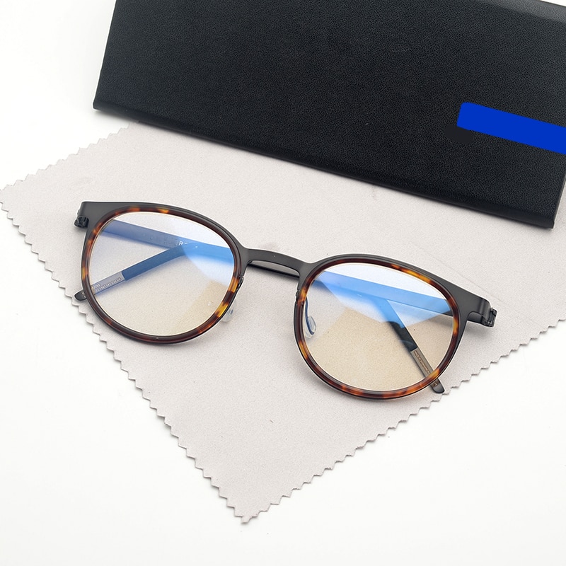 Thương hiệu đan mạch titanium gọng kính nam nữ cổ điển tròn cận kính mắt cho mắt không vít kính thuốc gọng kính 9704